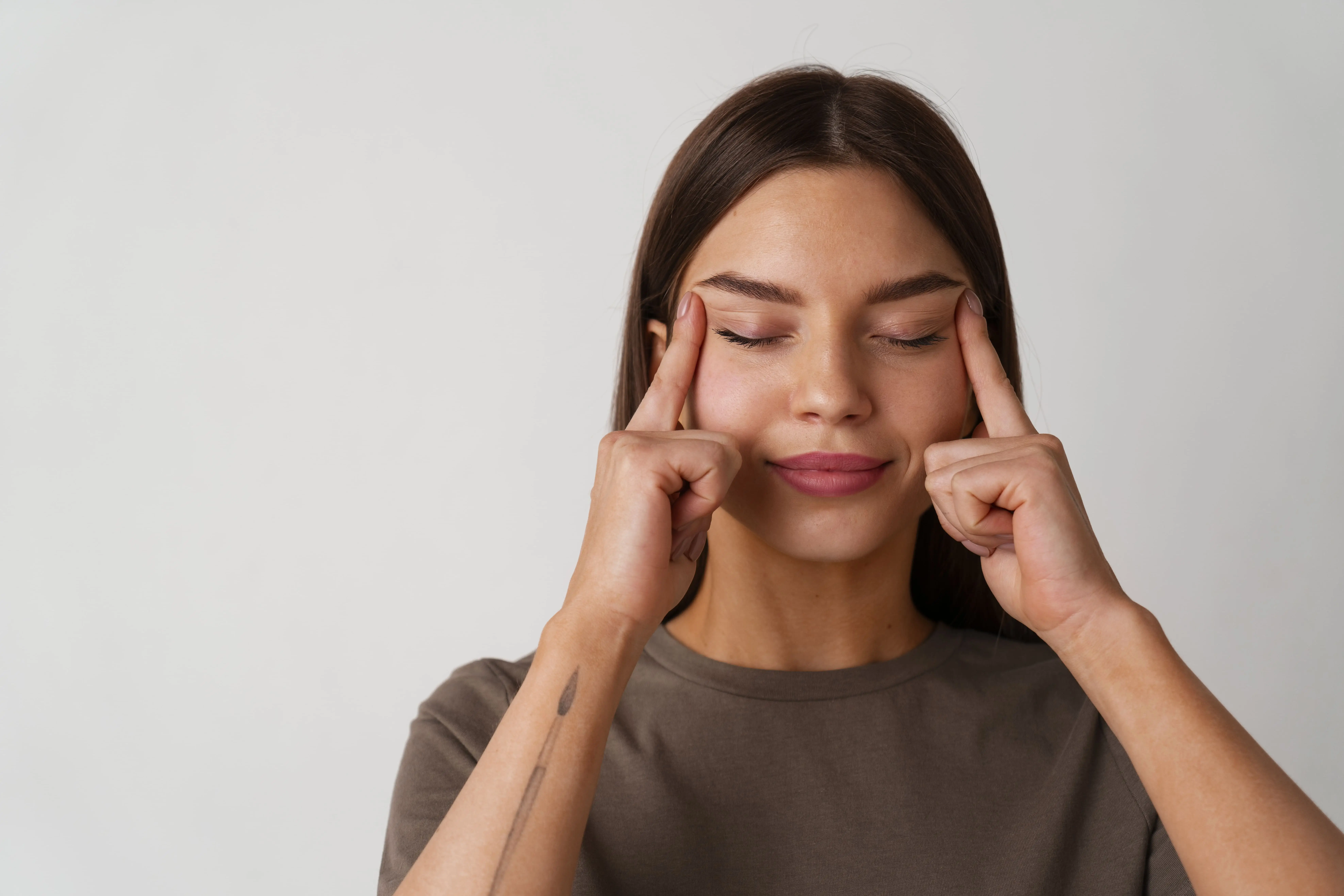 portrait-young-woman-practicing-facial-yoga-youth-10-1