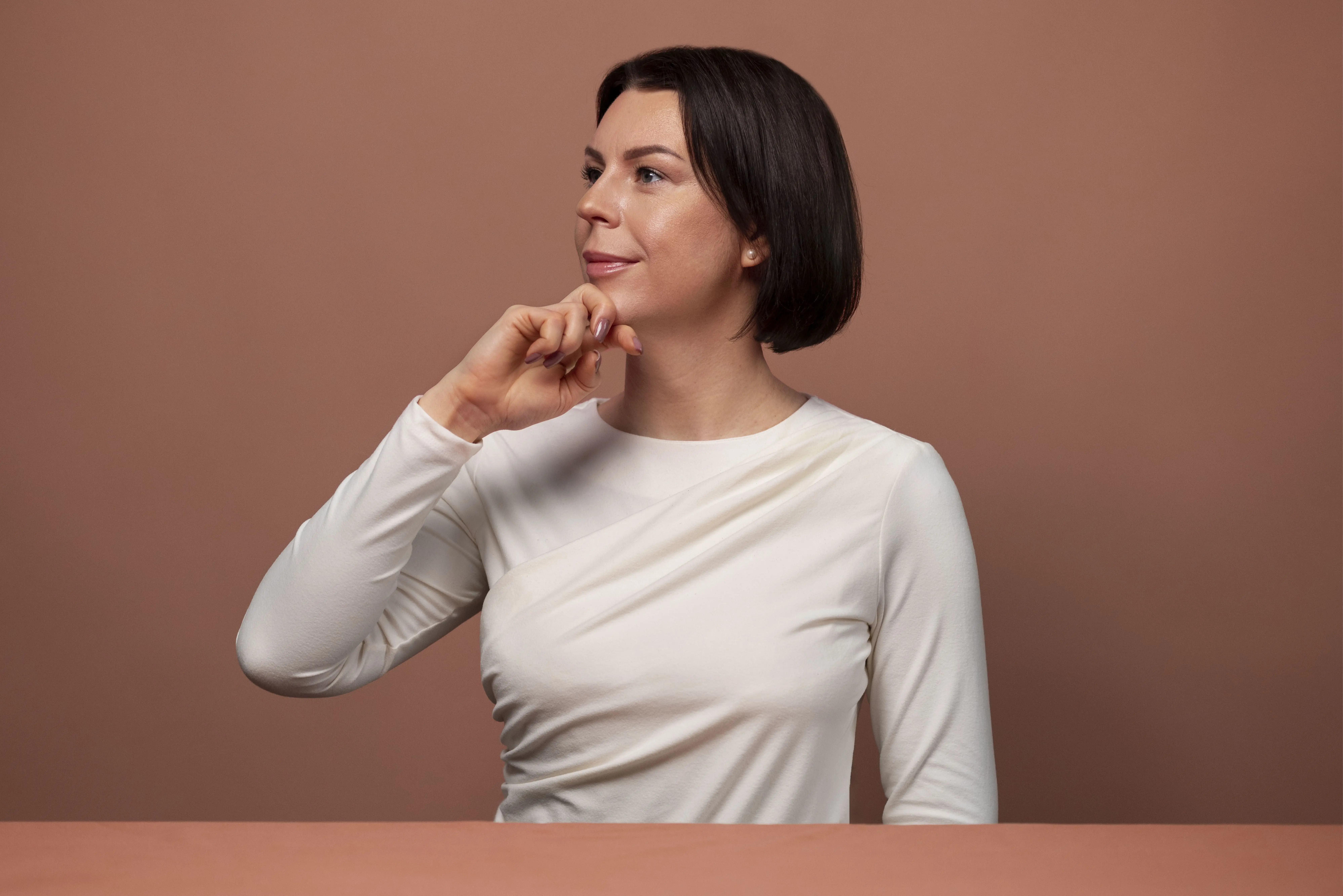 side-view-woman-practicing-facial-yoga-5-1